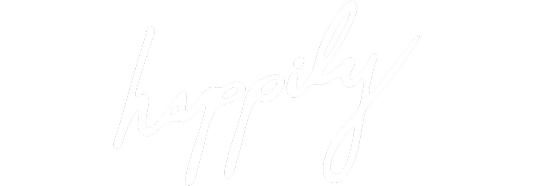 The word "happily" is written in a white, cursive script on a light gray background.